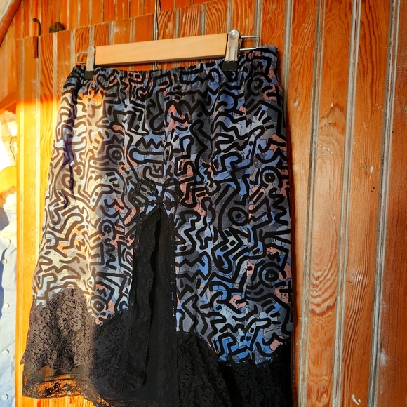 Coach skirt gently worn. Black and blue with pink. Length just above the knee. - Picture 1 of 2